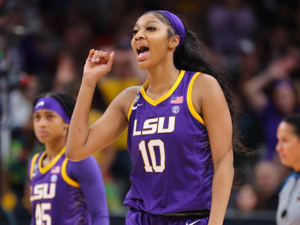 Angel Reese #10 of the Louisiana State Tigers celebrates a play against the Iowa Hawkeyes during the 2023 NCAA Women's Basketball Tournament National Championship at American Airlines Center on April 2, 2023 in Dallas, Texas.