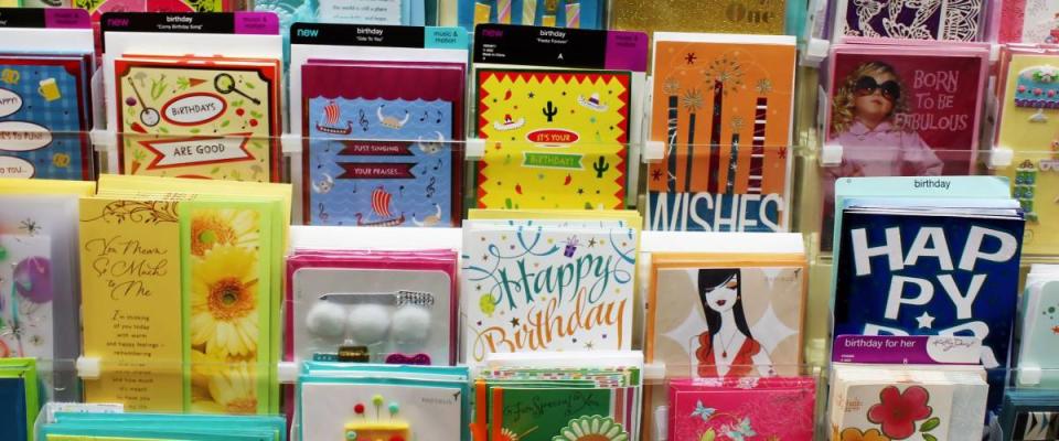 TORONTO, CANADA - NOVEMBER 30, 2013: Greeting cards on display in a store. Hallmark Cards and American Greetings are the largest producers of greeting cards in the world.