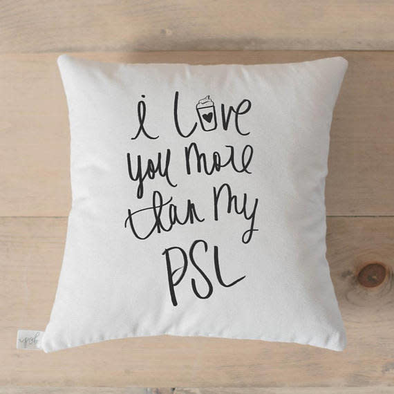 Get it <a href="https://www.etsy.com/listing/536343738/throw-pillow-i-love-you-more-than-my-psl" target="_blank"><strong>here</strong></a>, $20+.