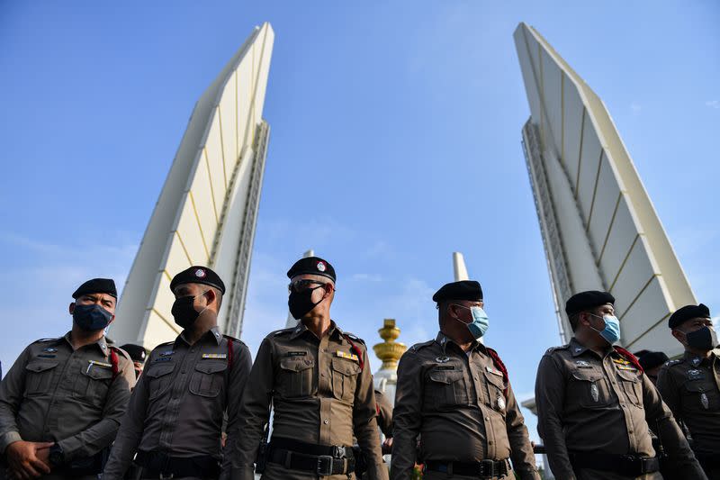 Thai police officers are seen during a protest demanding the resignation of the government in Bangkok