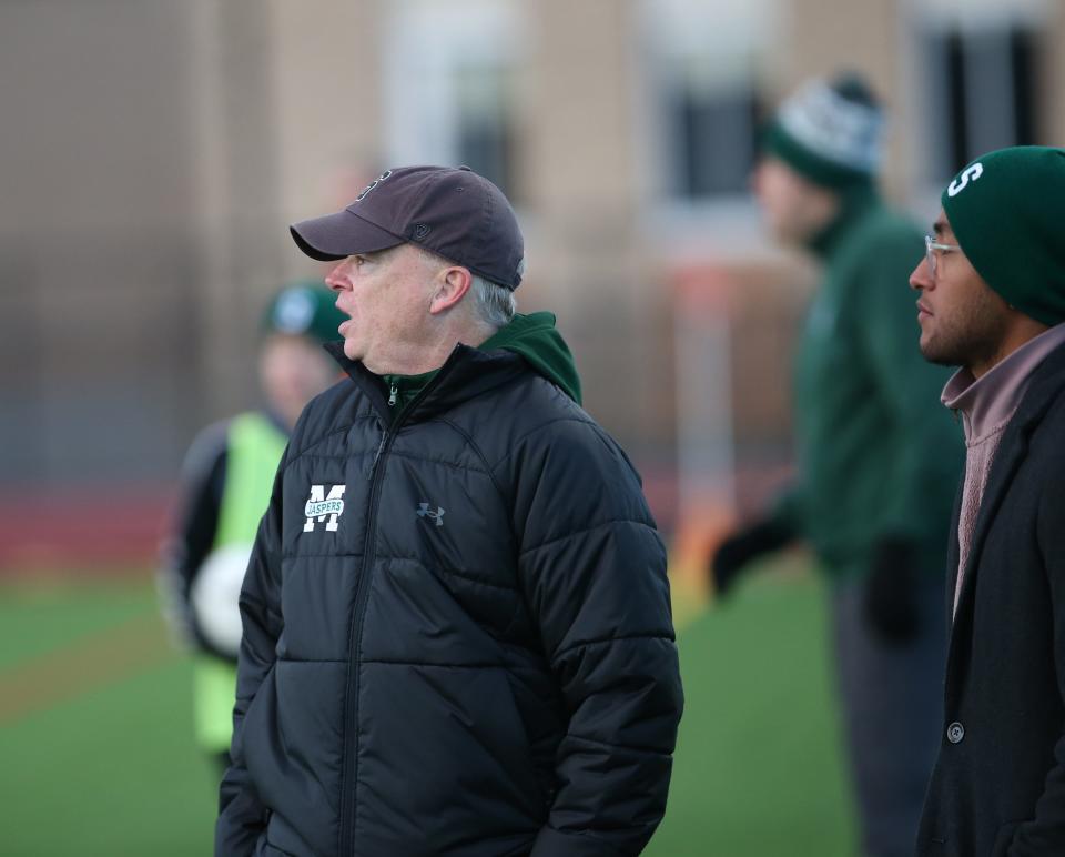 Spackenkill coach Brendan Cross looks on from the sideline during his team's Class B subregional game against Keio Academy in November.