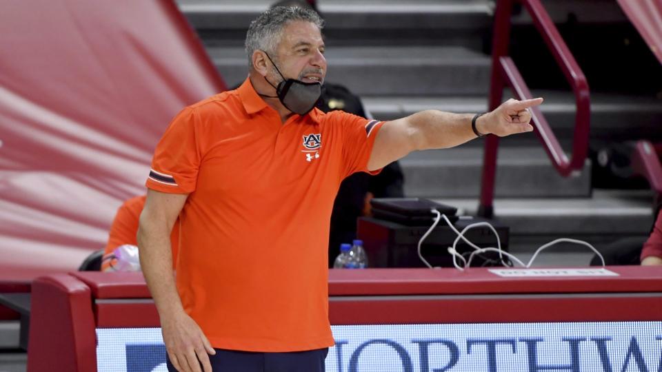 Mandatory Credit: Photo by Michael Woods/AP/Shutterstock (11719658b)Auburn coach Bruce Pearl reacts to a call during the second half of the team's NCAA college basketball game against Arkansas, in Fayetteville, ArkAuburn Arkansas Basketball, Fayetteville, United States - 20 Jan 2021.