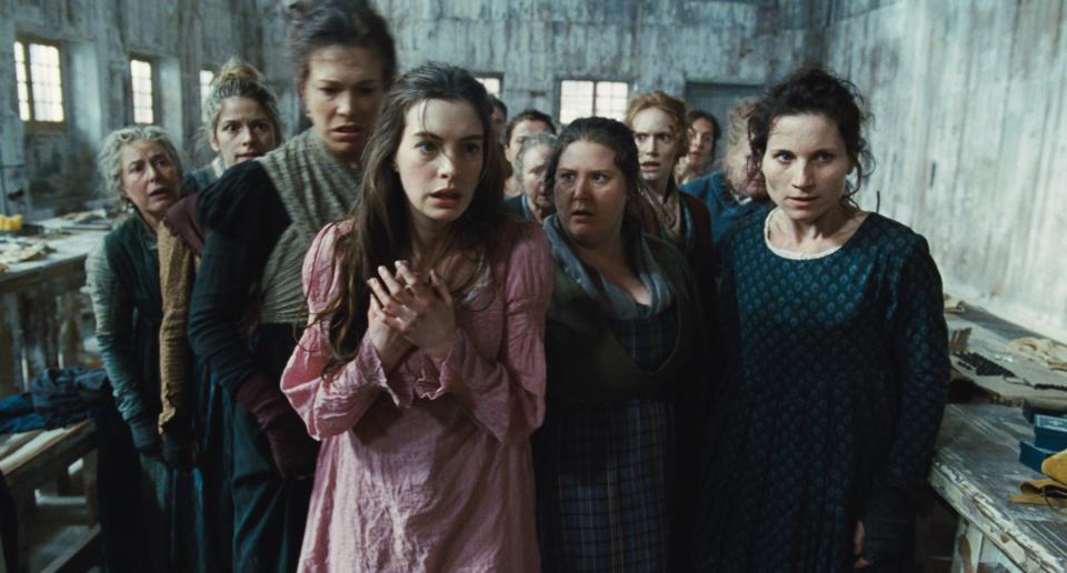 LES MISERABLES, Anne Hathaway (pink dress), 2012. ©Universal Pictures/Courtesy Everett Collection