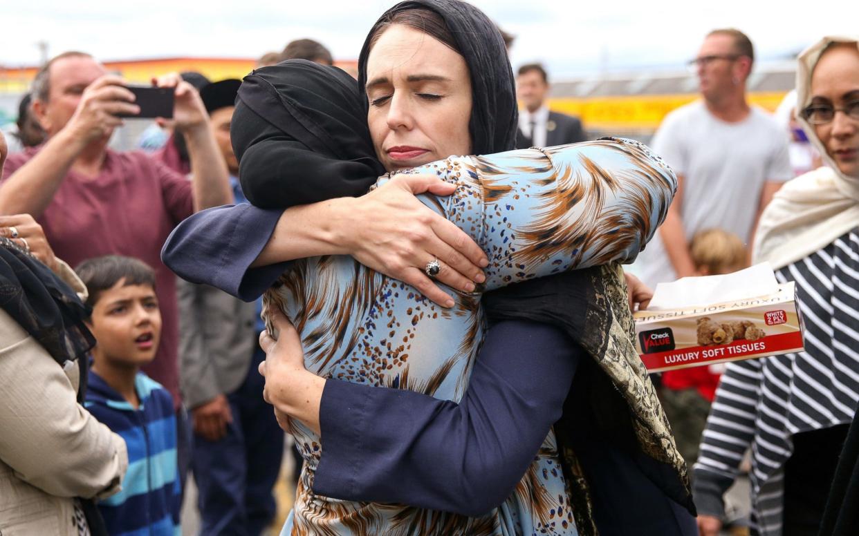 Prime Minister Jacinda Ardern hugs a mosque-goer at the Kilbirnie Mosque on Sunday in Wellington - Getty Images AsiaPac