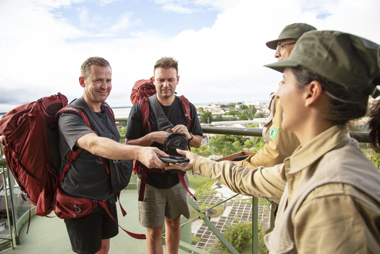 Celebrity Race Across the World's Scott Mills and his husband hand over their phones