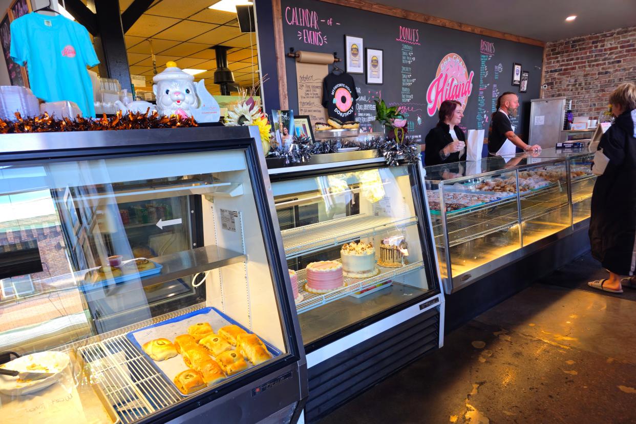 The counter at ChaCha's Hiland Bakery showcases Champagne cakes, doughnuts, pastries and more on a Sunday morning in the Highland Park neighborhood of Des Moines.