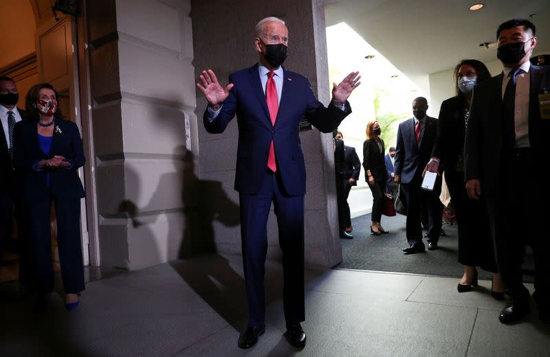 U.S. President Joe Biden talks to reporters after meeting with Democratic lawmakers to promote his bipartisan infrastructure bill at U.S. Capitol in Washington