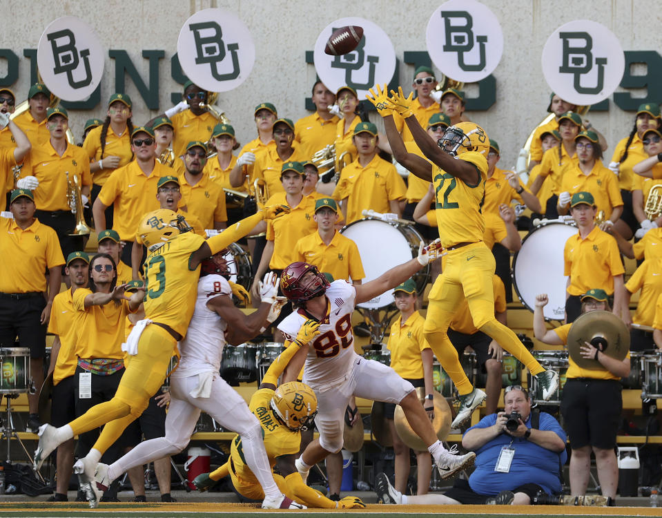 Baylor's JT Woods (22) intercepts a two point conversion intended for Iowa State tight end Charlie Kolar (88) in the second half of an NCAA college football game, Saturday, Sept. 25, 2021, in Waco, Texas. (Jerry Larson/Waco Tribune-Herald via AP)