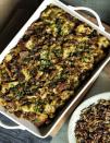 <p>This sausage-filled stuffing is practically a meal in itself. But luckily, it only takes 20 minutes to prepare. Then, just pop it in the oven as you work on other dishes. </p><p>Get the <a href="https://www.womansday.com/food-recipes/food-drinks/recipes/a60486/sourdough-stuffing-with-sausage-and-herbs-recipe/" rel="nofollow noopener" target="_blank" data-ylk="slk:Sourdough Studding with Sausage and Herbs recipe;elm:context_link;itc:0;sec:content-canvas" class="link "><strong>Sourdough Studding with Sausage and Herbs recipe</strong></a>.</p>