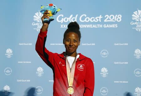 Diving - Gold Coast 2018 Commonwealth Games - Women's 3m Springboard Medal Ceremony - Optus Aquatic Centre - Gold Coast, Australia - April 14, 2018. Gold medalist Jennifer Abel of Canada on the podium. REUTERS/David Gray