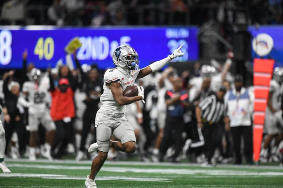 Howard wide receiver Breylin Smith intercepts the ball and runs it in for a touchdown during the Cricket Celebration Bowl game between Florida A&M University and Howard University at Mercedes-Benz Stadium. (Credit: Katie Goodale-USA Today Network)