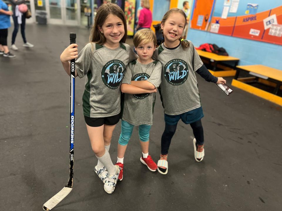 Smoky Mountain Lady Wild players ready for practice: Reagan Haase, 9; Emma Bruchey, 7; and Maddie Monckton, 8.