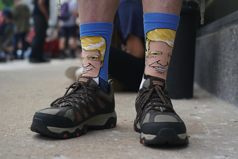 TULSA, OK - JUNE 20: A Donald Trump supporter shows his socks that depict President Donald Trump prior to a campaign rally for President Donald Trump on June 20, 2020 in Tulsa, Oklahoma. Trump is scheduled to hold his first political rally since the start of the coronavirus pandemic at the BOK Center on Saturday while infection rates in the state of Oklahoma continue to rise. (Photo by Michael B. Thomas/Getty Images)