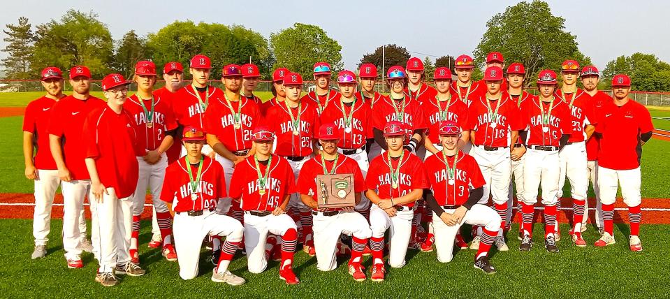 The Hiland Hawks celebrated their third straight East District championship with an 11-1 win over Conotton Valley.