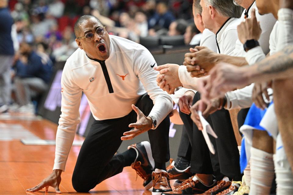 Texas men's basketball coach Rodney Terry speaks to his bench during the first half of the Longhorns' win over Penn State in the NCAA Tournament last week. On Monday, Terry agreed to a five-year deal to become the permanent head coach of the program.