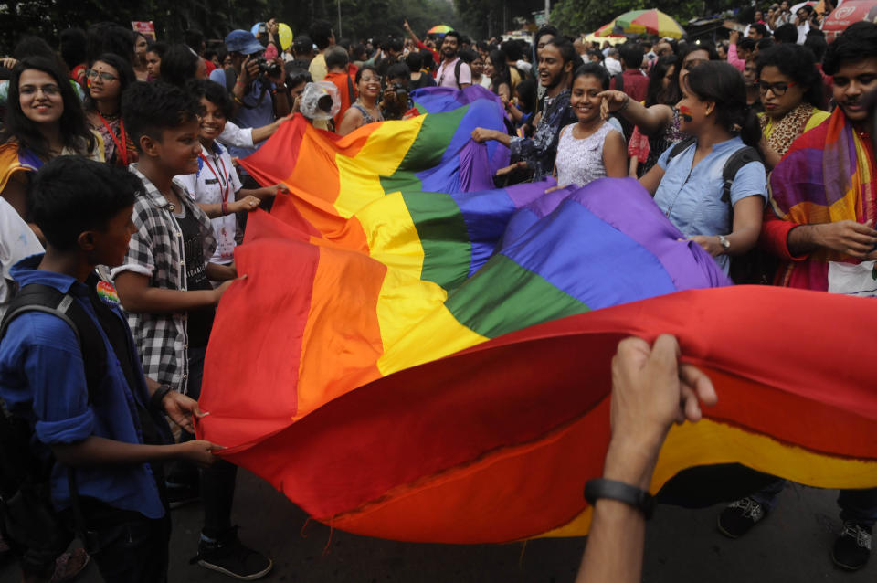 Members of LGBTQ community in Kolkata celebrate the decision by the Indian supreme court to decriminalize same-sex relationships on Sept. 6, 2018.<span class="copyright">Samir Jana–Hindustan Times/Getty Images</span>