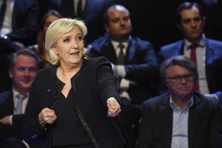 Marine Le Pen of French National Front (FN) attends a prime-time televised debate for the candidates at French 2017 presidential election in La Plaine Saint-Denis, near Paris, France, April 4, 2017. REUTERS/Lionel Bonaventure/Pool