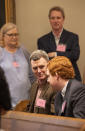 Randy Murdaugh talks with his nephew Buster Murdaugh seen with John Marvin Murdaugh and Lynn Murdaugh Goette during the double murder trial of Alex Murdaugh at the Colleton County Courthouse in Walterboro, S.C., Thursday, Feb. 2, 2023. (Andrew J. Whitaker/The Post And Courier via AP, Pool)