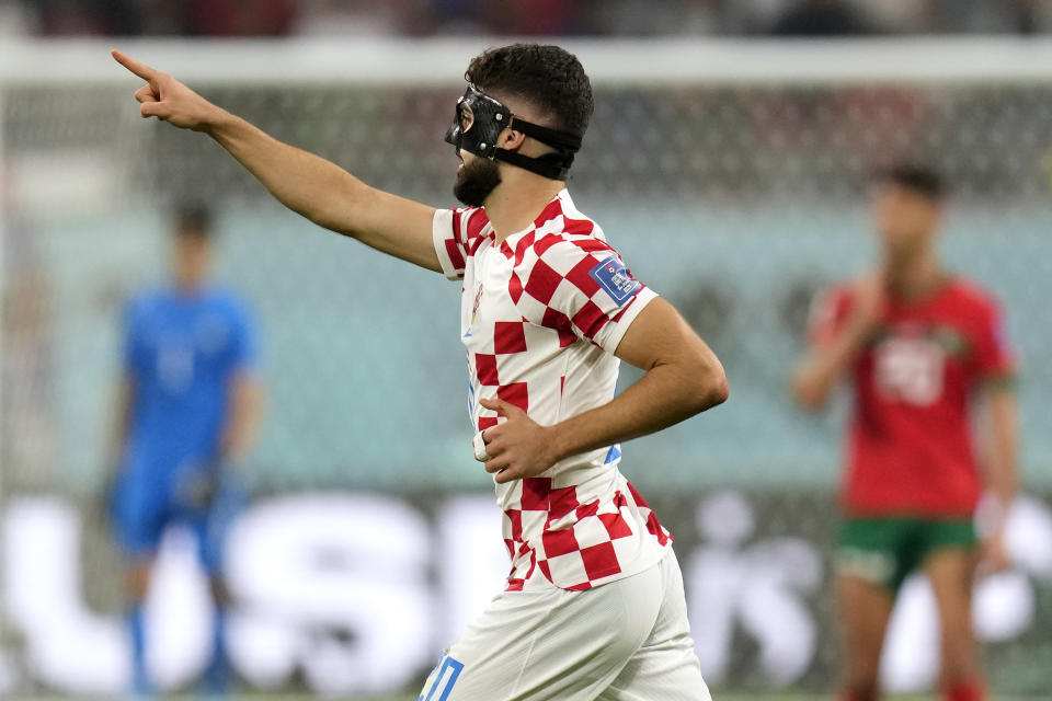 Croatia's Josko Gvardiol, right, celebrates his side's first goal during the World Cup third-place playoff soccer match between Croatia and Morocco at Khalifa International Stadium in Doha, Qatar, Saturday, Dec. 17, 2022. (AP Photo/Andre Penner)