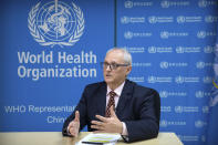 Dr. Gauden Galea, the World Health Organization (WHO) representative in China, speaks during an interview with The Associated Press at the WHO's offices in Beijing, Thursday, Jan. 23, 2020. Galea said that “trying to contain a city of 11 million people is new to science,” as Wuhan canceled departing trains and flights amid a viral outbreak that the representative said could infect thousands. (AP Photo/Mark Schiefelbein)
