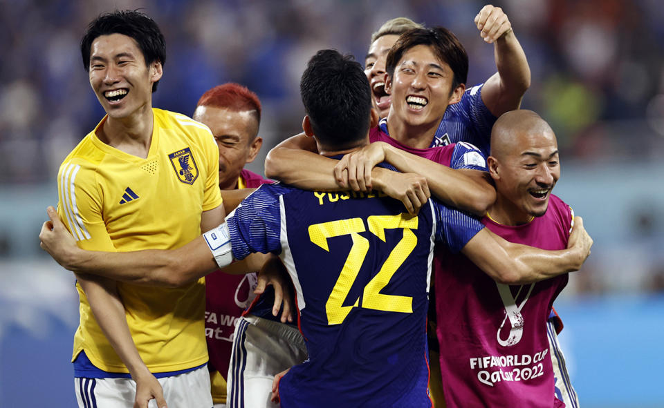 Japan players, pictured here celebrating after their win over Spain at the World Cup.