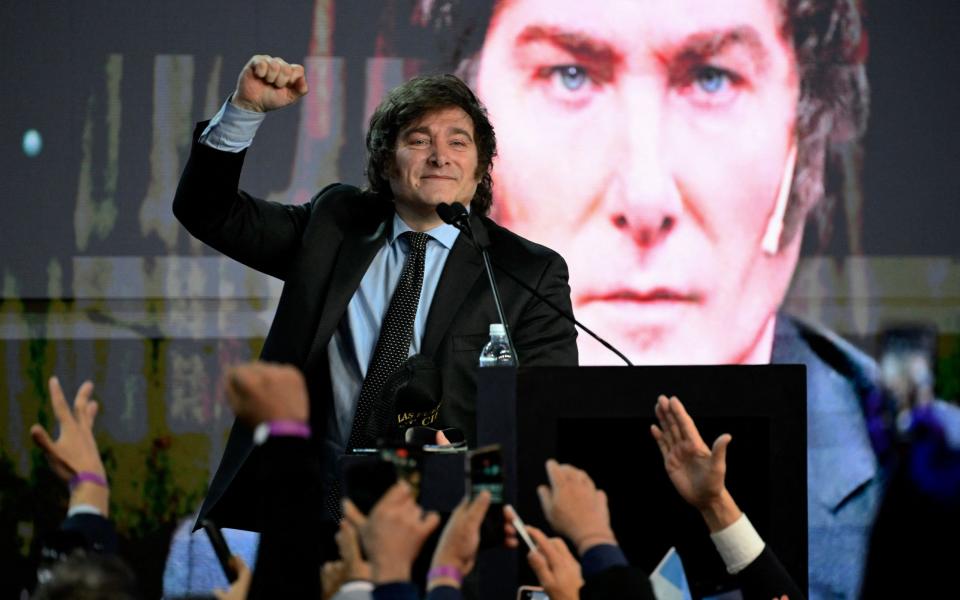 Argentine presidential candidate for La Libertad Avanza Alliance, Buenos Aires lawmaker Javier Milei, gestures during a campaign rally with union workers in Buenos Aires on September 22, 2023