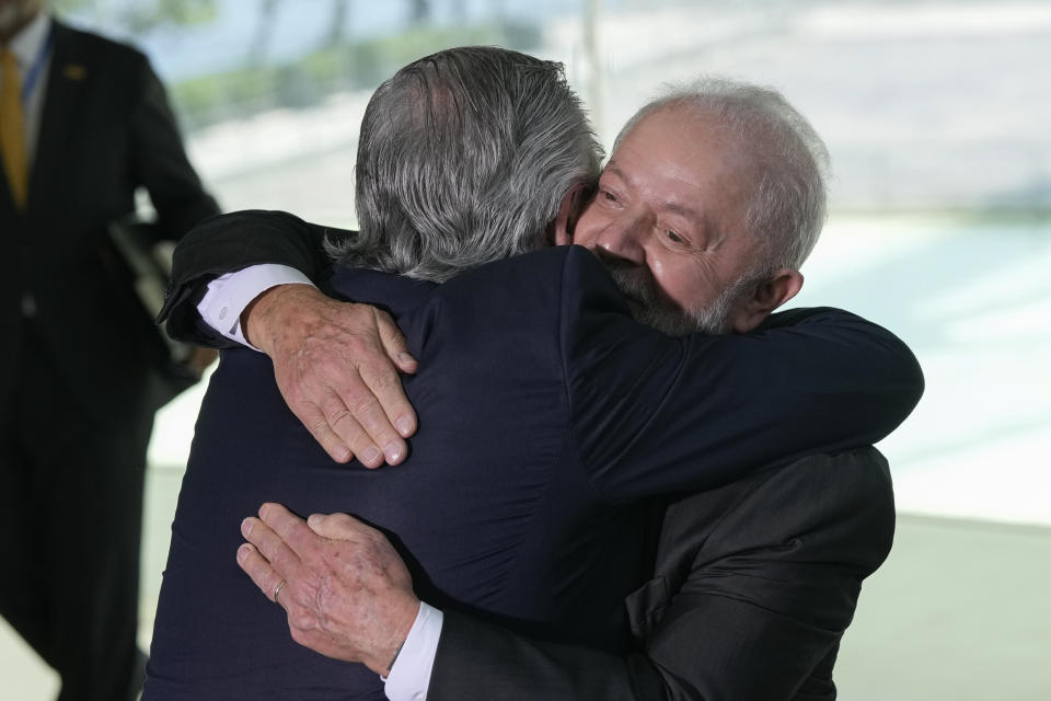 Argentina's President Alberto Fernandez, left, and Brazilian President Luiz Inacio Lula da Silva, embrace during arrivals for the 63rd Mercosur Summit, in Rio de Janeiro, Brazil, Thursday, Dec. 7, 2023. (AP Photo/Silvia Izquierdo)