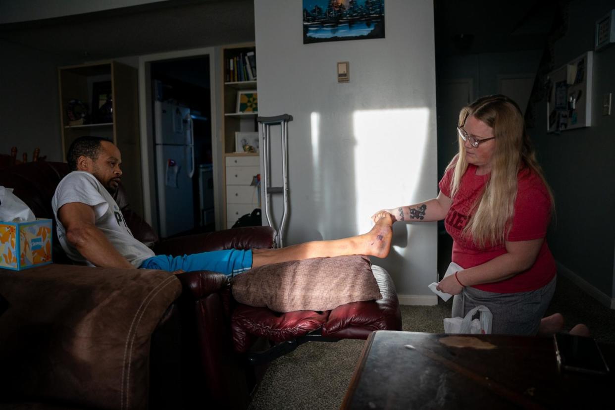 PHOTO: Jacob Gooch Sr. and Emily Tavis received an outpouring of emotional and financial support in the days after they were both shot at the Kansas City Chiefs Super Bowl parade.  (Christopher Smith for KFF Health News)