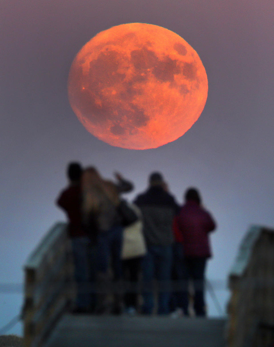 A supermoon rises at 4:14 p.m. Sunday in Plymouth, Massachusetts.&nbsp;