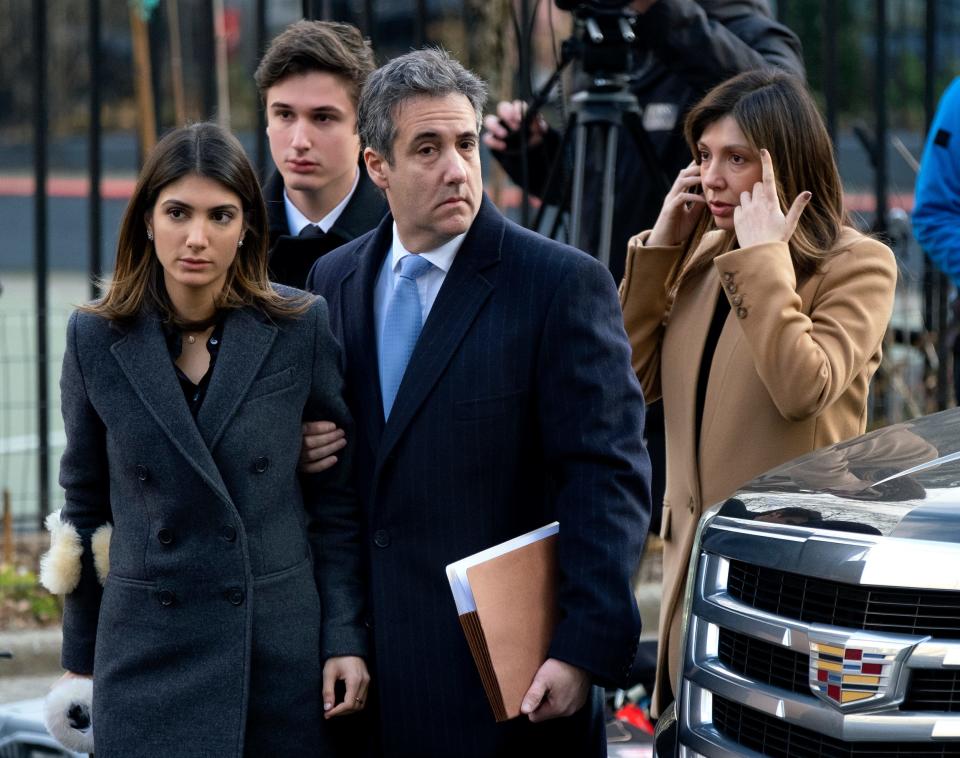Michael Cohen is accompanied by his wife and children as he arrives to his 2018 sentencing hearing