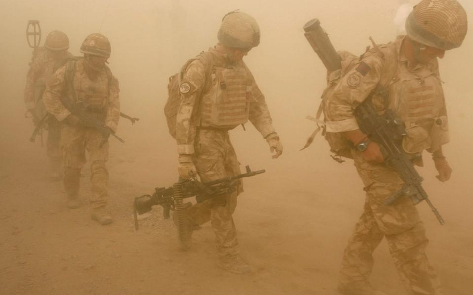 British soldiers from B Company, 2 Mercian, set off on an operation in Malgir, Helmand province July 27, 2009. - Reuters