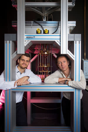 Quantum computation engineers Andrea Morello (R) and Guilherme Tosi from the University of New South Wales are photographed in this handout imaged in Sydney, Australia, July 24, 2017. Picture taken July 24, 2017. University of New South Wales/Quentin Jones/Handout via REUTERS