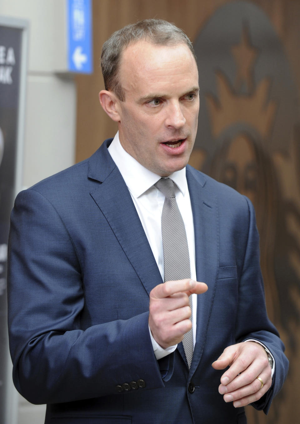 Secretary of State for Existing the European Union Dominic Raab looks on during a speech at the Conservative Party Conference at the ICC, in Birmingham, England, Monday, Oct. 1, 2018. (AP Photo/Rui Vieira)