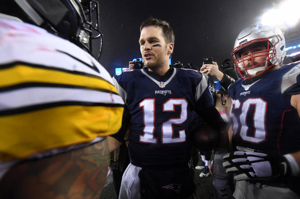  Jan 22, 2017; Foxborough, MA, USA; New England Patriots quarterback Tom Brady (12) shakes hands with Pittsburgh Steelers inside linebacker Ryan Shazier (50) after the 2017 AFC Championship Game at Gillette Stadium. Mandatory Credit: James Lang-USA TODAY Sports