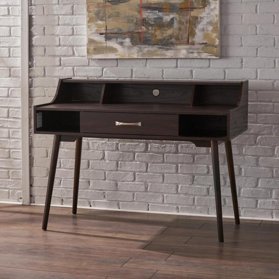 If you've been working from home recently, you might want to invest in a desk that you can <i>actually</i> work at. With this desk, you can fit your cords through the hole in the back and keep all your pens organized in the drawer. <a href="https://fave.co/30N1Lac" target="_blank" rel="noopener noreferrer">Originally $197, get it now for $171 at The Home Depot</a>.