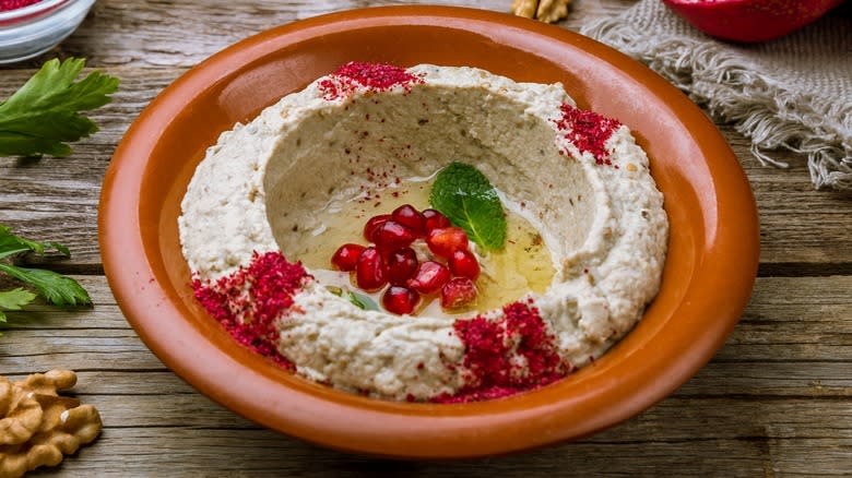 Mutabal topped with pomegranate seeds