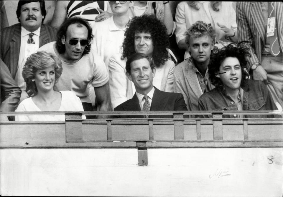 Brian May and Roger Taylor with The Prince And Princess of Wales and organiser Bob Geldof At The Live Aid Concert, Wembley Stadium (Aidan Sullivan/ANL/Shutterstock)