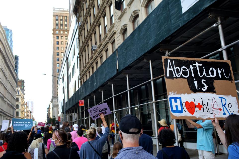 Crowds march toward Washington Square Park for the Women's March on Oct. 2 in New York City. Groups organized marches across the country to protest the new abortion law in Texas.