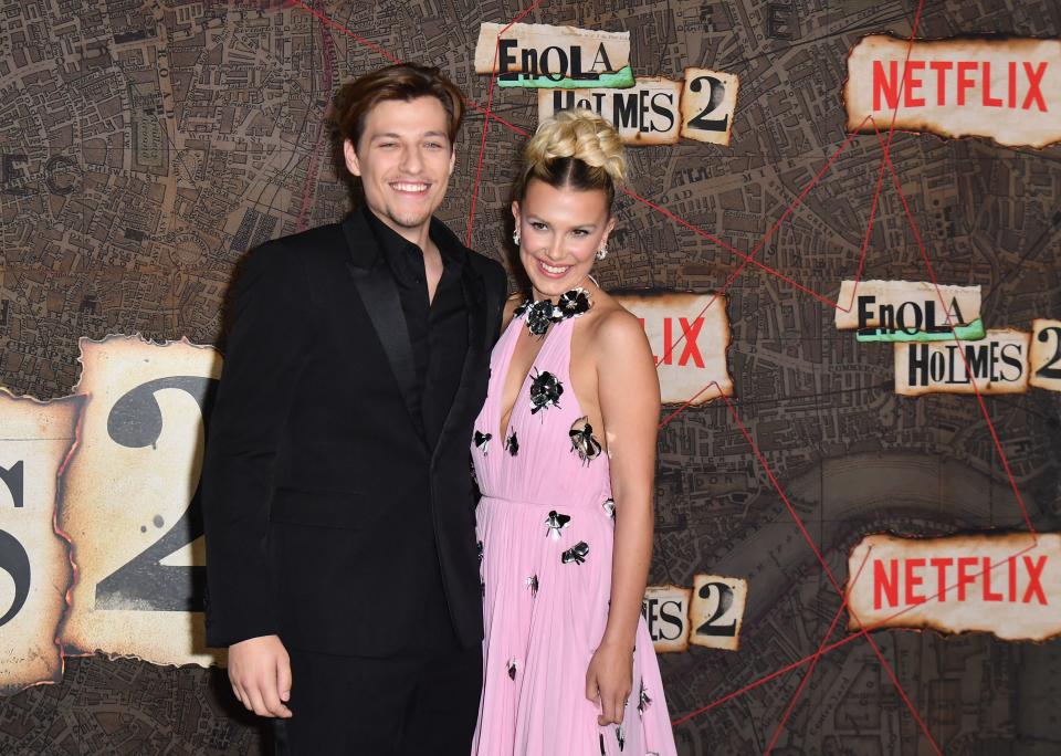 Jake Bongiovi (L) and British actress Millie Bobby Brown arrive for the premiere of Netflix's 