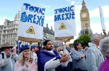 Demonstrators react in Parliament Square during the anti-Brexit 'People's March for Europe', in central London, Britain September 9, 2017. REUTERS/Tolga Akmen/Files
