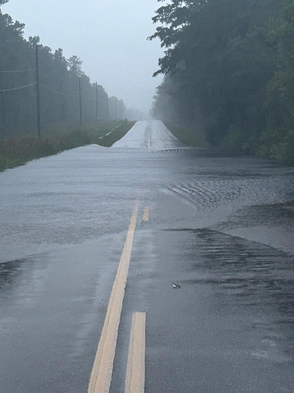 A section of N.C. 133 near Funston Road sits under water during Tropical Storm Debby on August 7, 2024. According to NCDOT representatives, this section of roadway sees two to three feet of water during major storm events. It is scheduled for improvements this fall.