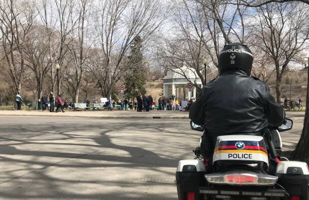 Police say they're still investigating an off-duty officer's participation in an anti-lockdown rally hosted in Saskatoon last weekend, but the person in question has resigned. (Leisha Grebinski/CBC - image credit)