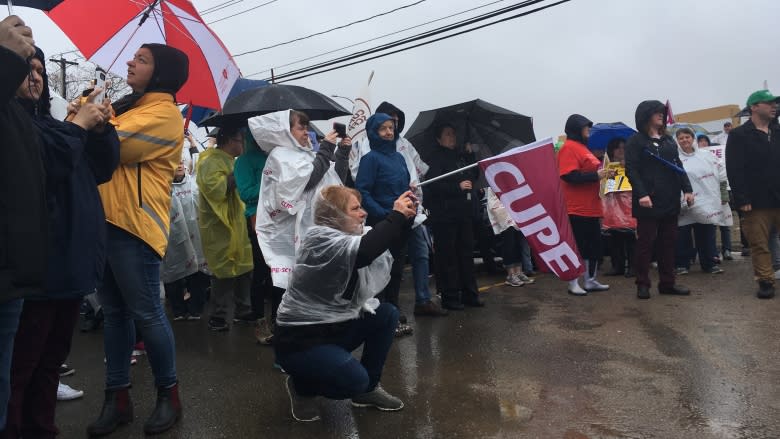 Nursing home workers demonstrate, threaten strike