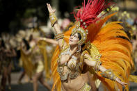 <p>Costumed revellers perform in the parade during the Notting Hill Carnival in London, Monday, Aug. 27, 2018. (Photo: Tim Ireland/AP) </p>