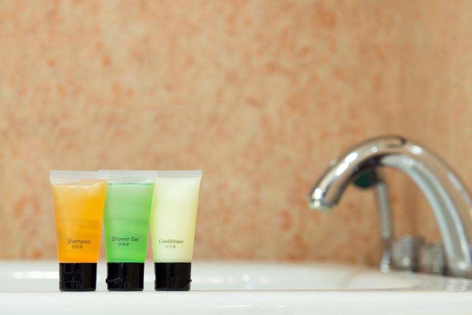 Set of toiletries placed at sink in the bathroom