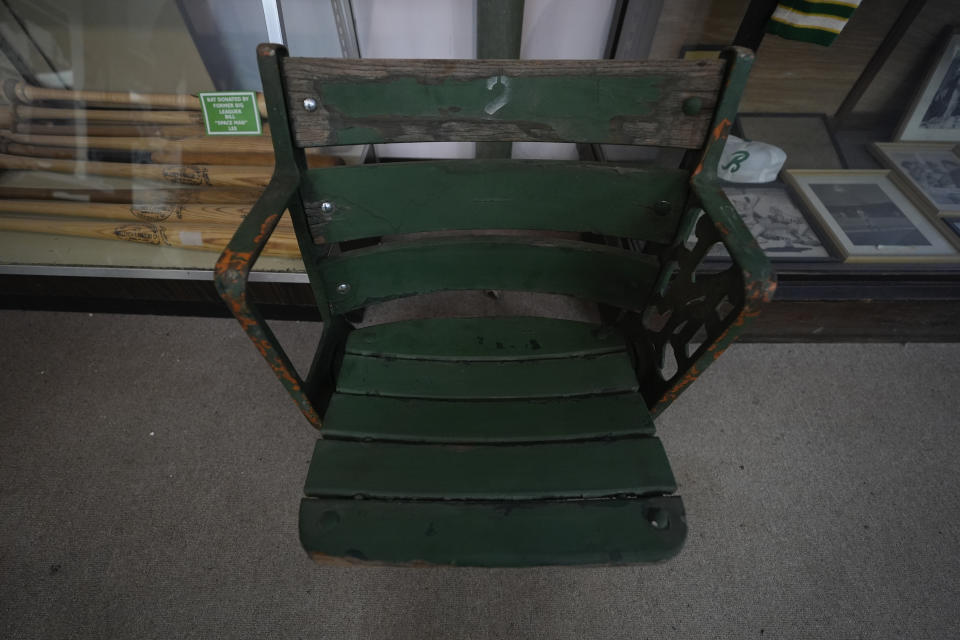 An antique chair, formally used inside Rickwood Field, is on display in a shop, Monday, June 10, 2024, in Birmingham, Ala. Rickwood Field, known as one of the oldest professional ballpark in the United States and former home of the Birmingham Black Barons of the Negro Leagues, will be the site of a special regular season game between the St. Louis Cardinals and San Francisco Giants on June 20, 2024. (AP Photo/Brynn Anderson)