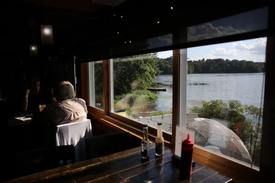 The Dudley Chateau offers a great view overlooking Dudley Pond, which is near Lake Cochituate, in Wayland, July 13, 2022.