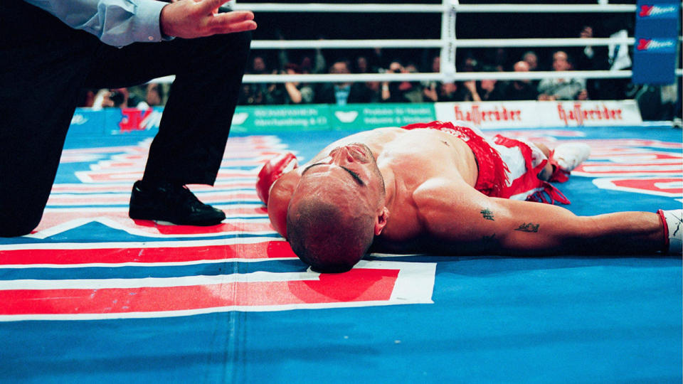 Anthony Mundine out cold. (Photo by Andreas Rentz/Bongarts/Getty Images)