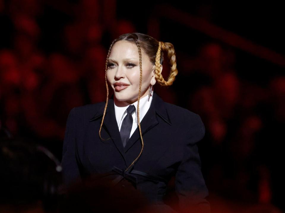 Madonna speaks onstage (Getty Images)