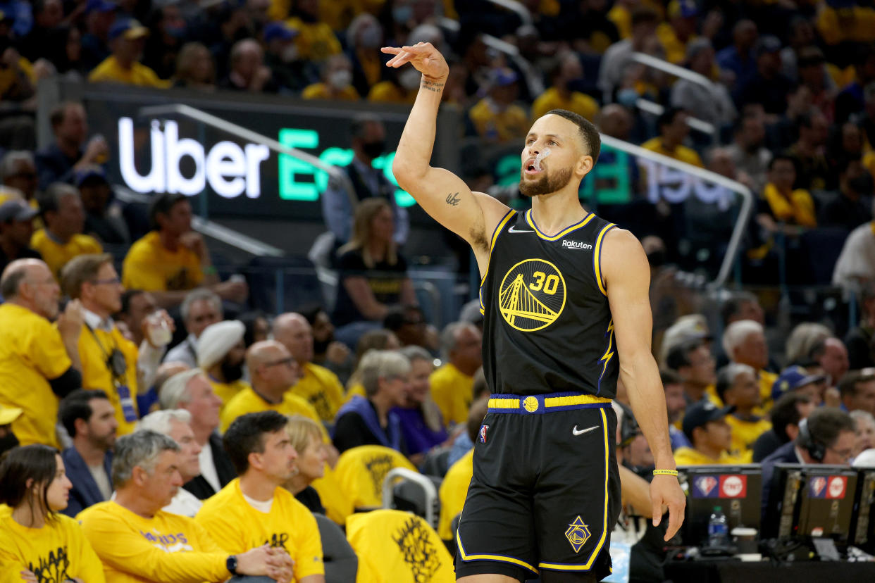 Stephen Curry had a game-high 21 points and 12 rebounds in Golden State's 112-87 rout of the Dallas Mavericks in Game 1 of the 2022 Western Conference finals. (Photo by Harry How/Getty Images)